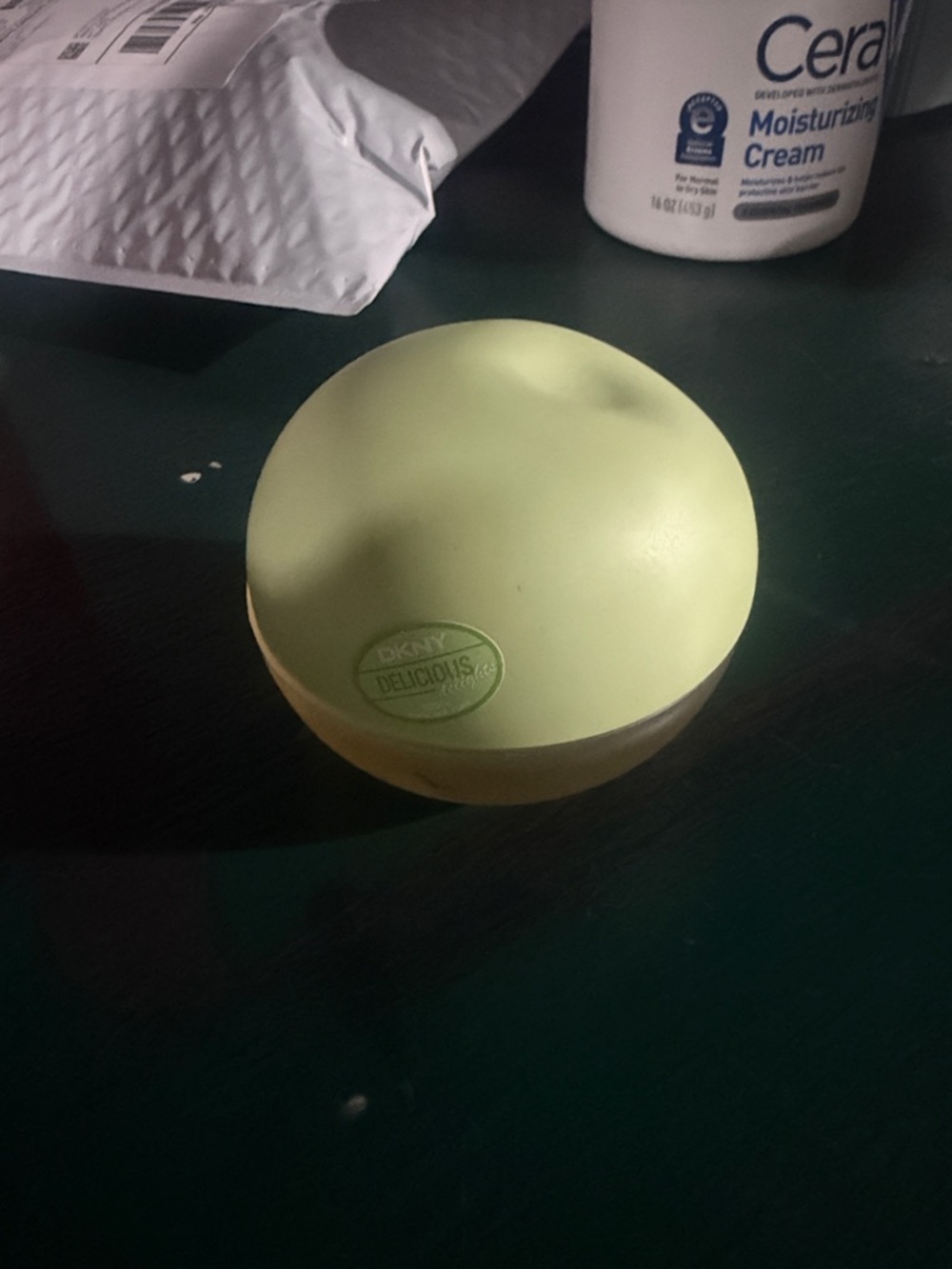 DKNY Delicious Light Green Round cool swirl perfume